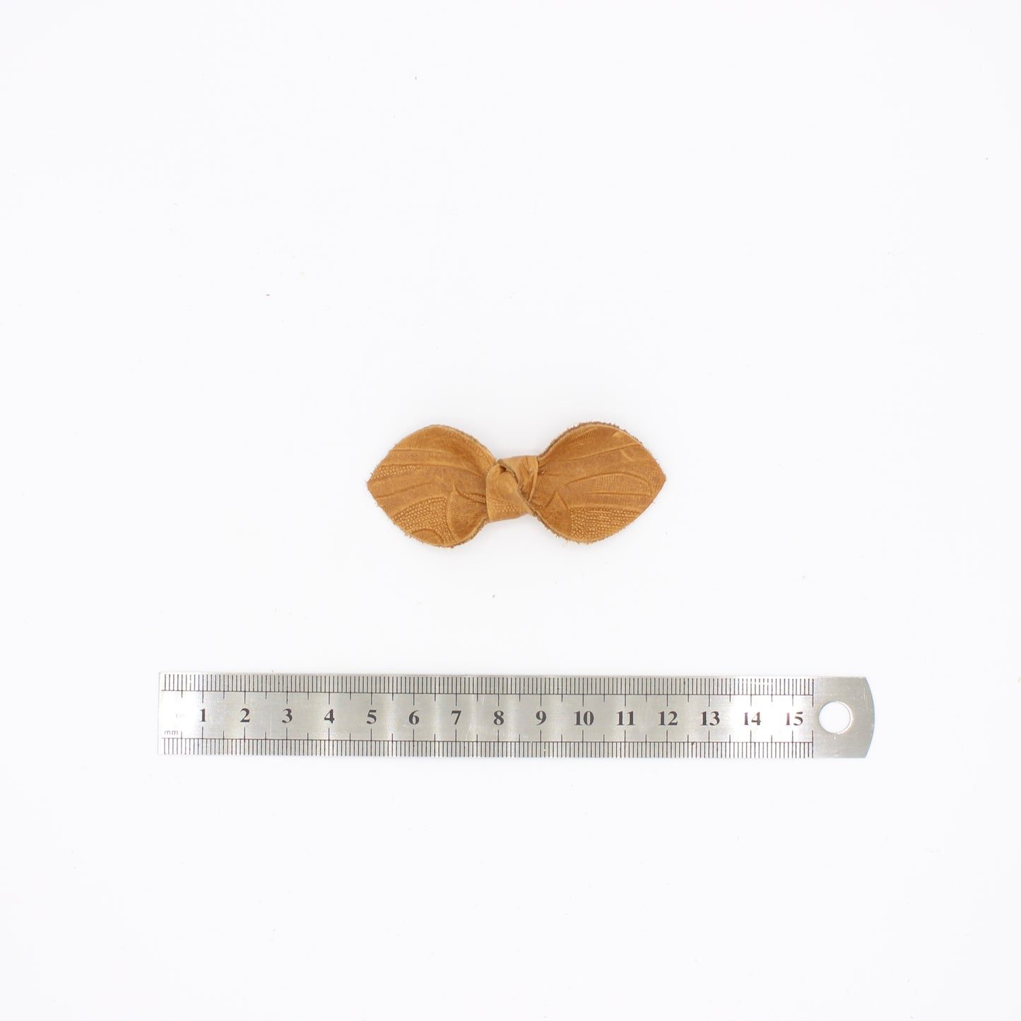 Tooled Tan Bow