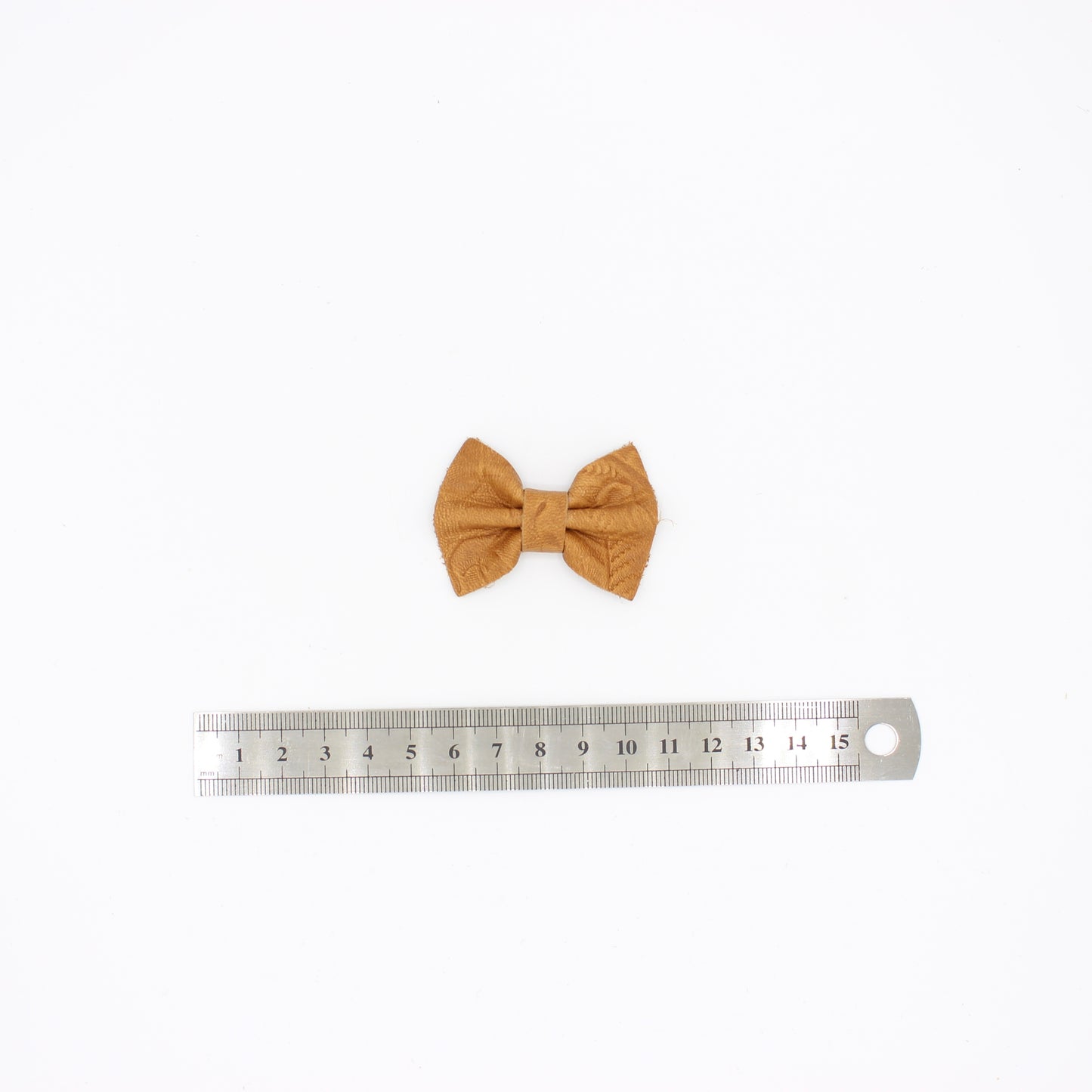 Tooled Tan Bow